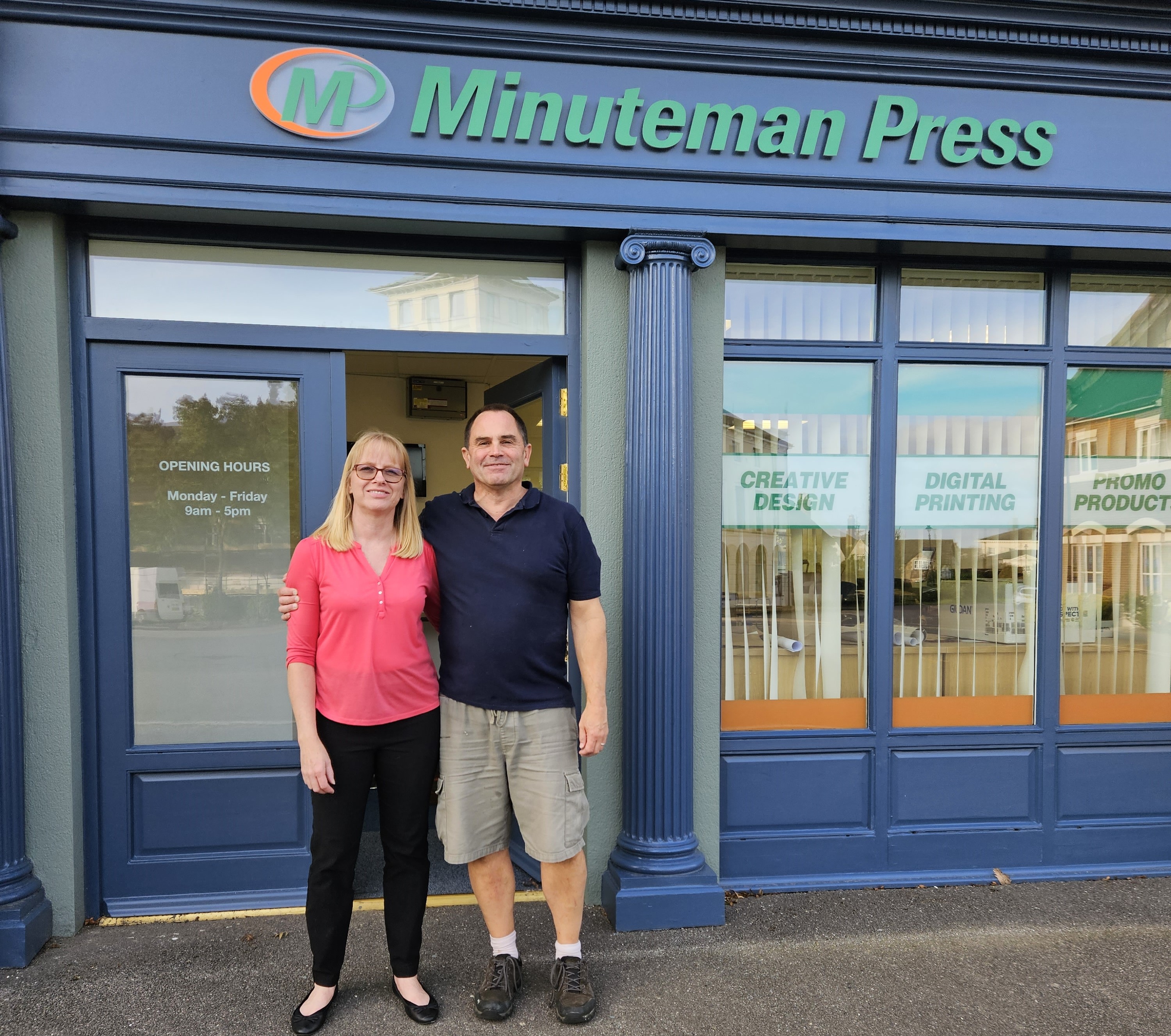 Owners Juanita and David Prince outside their new location for Minuteman Press in Poundbury and Dorchester. https://sellyourprintingbusiness.com